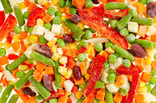 Mix of brightly chopped frozen vegetables. Healthy eating. Studio Photo