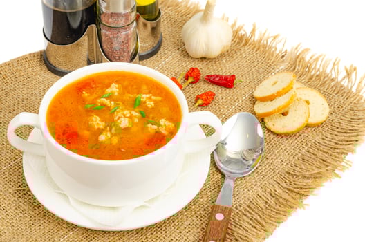 Thick homemade vegetable soup with rice, pumpkin and tomatoes photo