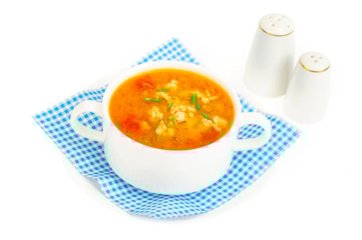 Thick homemade vegetable soup with rice, pumpkin and tomatoes photo