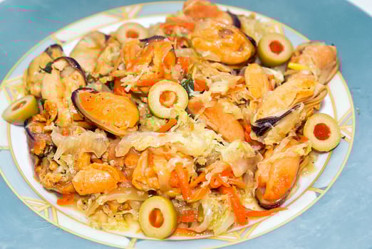 Dietary Food. Seafood Salad, Mussels and Fresh Vegetables. photo