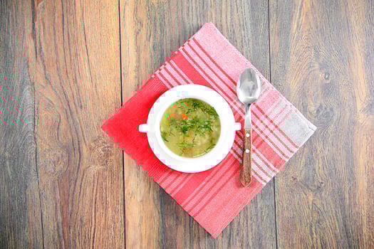 Vegetable Soup in a White Plate. photo
