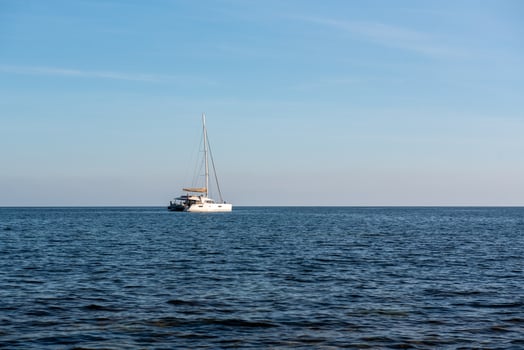 Sailboat off the coast of Formentera in the Mediterranean in Spain. photo