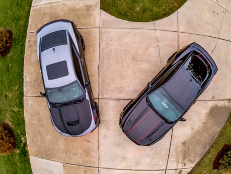 Two cars parked in private driveway photo