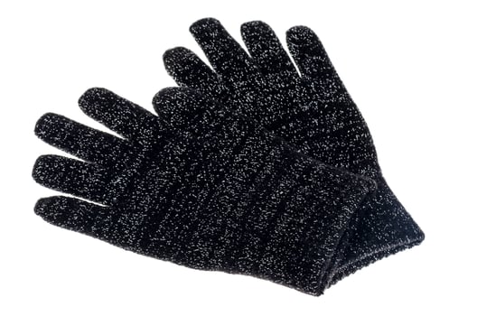 Black knitted baby gloves isolated on white background photo