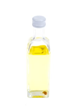 Small glass bottle with truffle oil Isolated on White background photo