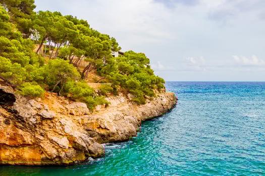 Panoramic drone shot of bay of Cala Santanyi, Mallorca, Spain. photo