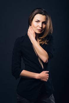 girl brunette beauty model in a black jacket photo