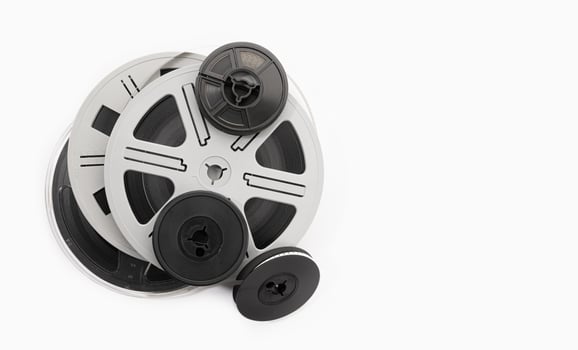 Super 8 film reels isolated on white background. Copy space photo
