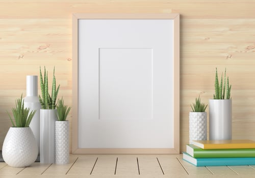 Mock up of poster frame in wooden floor modern interior top of table in living room isolated on light background, 3D render, 3D illustration photo
