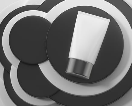 A squeeze tube for applying creams or cosmetics. photo