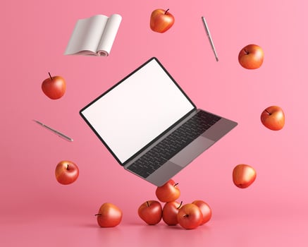 laptop with apple, pen and a book on pink background, 3D style. photo