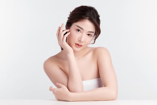 Beautiful young asian woman with clean fresh skin on white background, Face care, Facial treatment, Cosmetology, beauty and spa, Asian women portrait. photo
