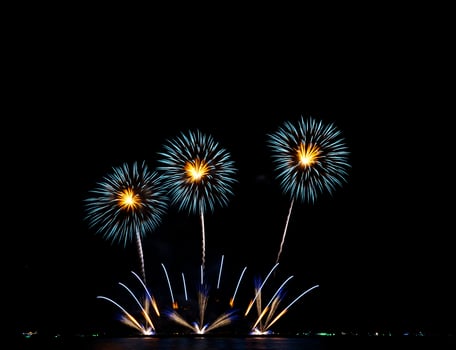 Fireworks at the sea in night time for celebration of new years photo
