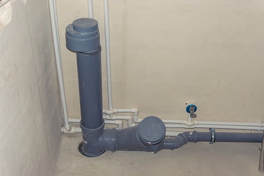 sewer pipes on building photo
