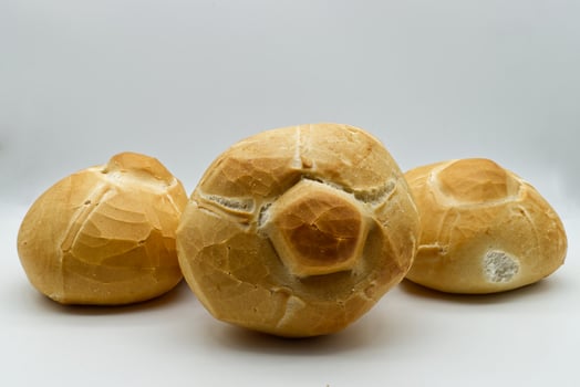Loaf of Rosetta bread on white background. Michetta, traditional Italian bread. photo