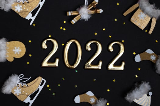 Top view flat New Year mockup on black background with numbers and New Year decor. New Year 2022, with copy space photo