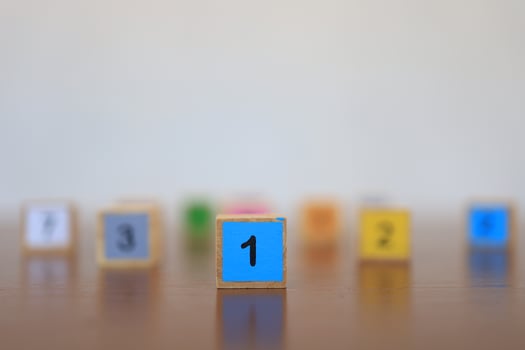 Wooden blocks with numbers, The concept of being a winning person and being a chosen person. photo