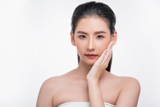 Beautiful woman, good looking face, touch her face. photo