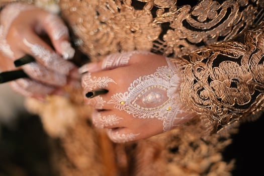 Bride henna carved beautiful and unique at bride's hand photo