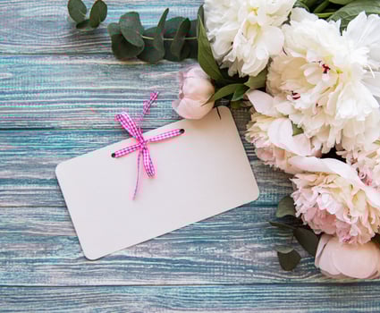 Wedding invitation with pink peonies photo