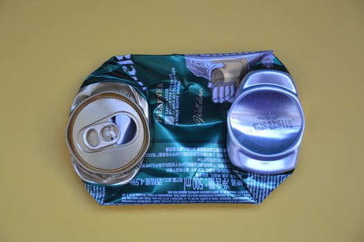 KIEV, UKRAINE - DECEMBER 22, 2021 Crumpled beer cans for scrap photo