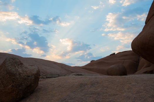 Beautiful hiking trail over sandstone at sunrise. Damaraland, Namibia. photo