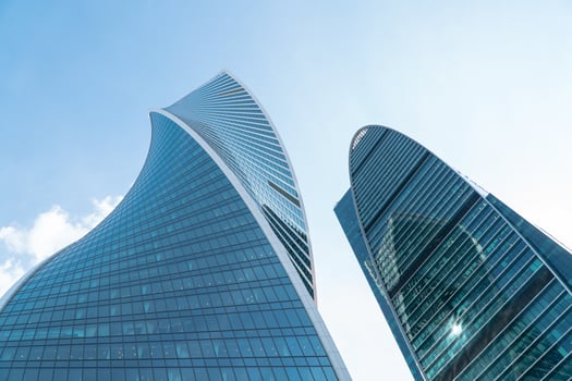 High rise buildings of the business center of Moscow. District Moscow-city against the day sky with clouds photo