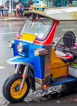Typical colorful tuk tuk in Bangkok Thailand. photo