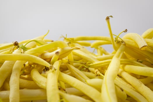 Yellow green beans on a white background. photo