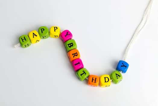 Toy blocks spelling out HAPPY BIRTHDAY photo