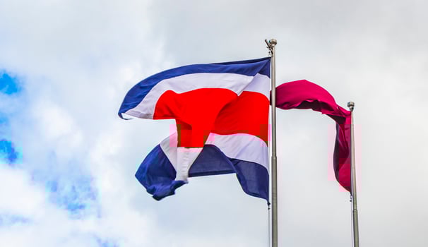 Flag of Costa Rica cloudy blue sky Costa Rican flag. photo