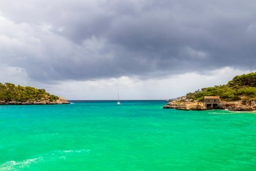 Turquoise beach bay Cala Samarador Amarador Mallorca Balearic Islands Spain. photo