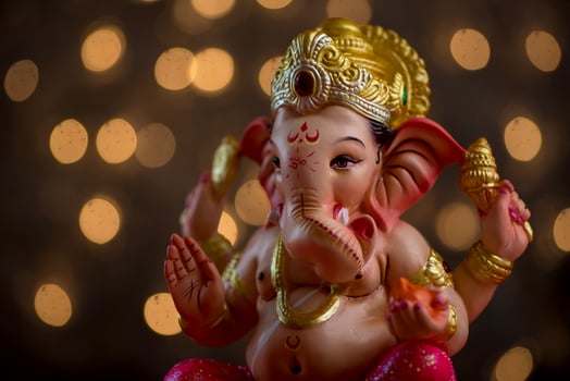 Hindu God Ganesha on Blured bokeh background, Ganesha Idol. photo