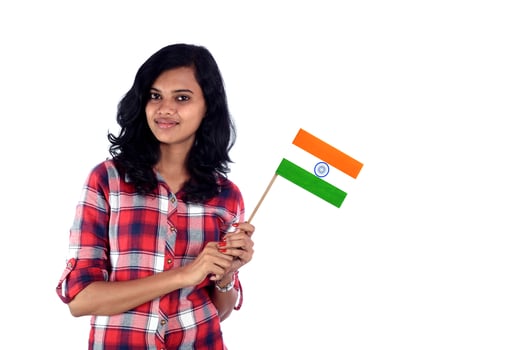 Girl with Indian flag or tricolor on white background, Indian Independence day, Indian Republic day photo