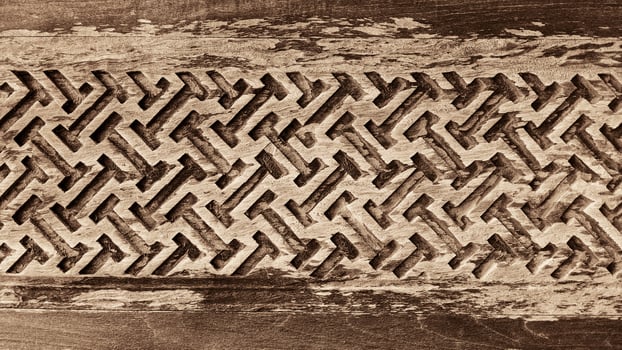 old wooden carving pattern background photo
