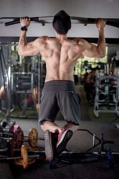 A fitness man work out in the gym photo