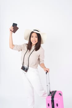 Beautiful Asian woman tourist  on white background photo