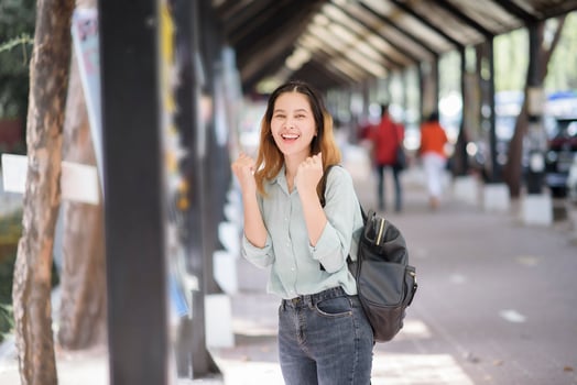 Happy young Asian University student. photo