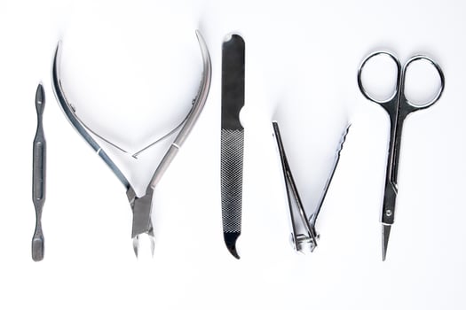 Tools for manicure and nail care on white background. photo