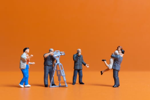 Miniature people Couple live stream marriage ceremony concept photo