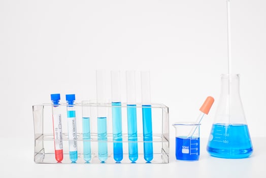 Laboratory background , microscope with lab glassware photo