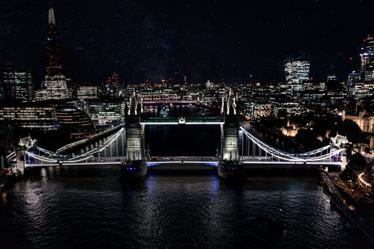 Beautiful view of the Tower bridge over river Thames at night. photo