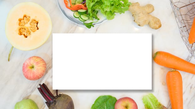 various fruits and vegetables with white paper card. Flat lay. Healthy eating concept. photo