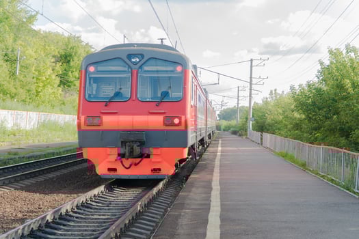 passenger train on the railway against the sky photo