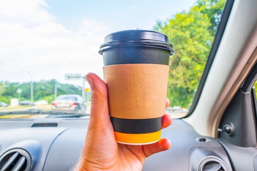 Mexican coffee to go holding while driving in Mexico. photo