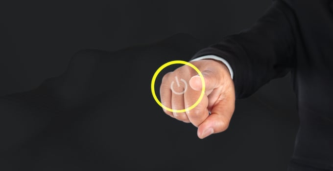 Businessman finger is about to hit the power button, business startup ideas photo