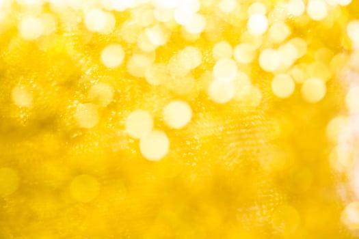 Gold spring or summer, Christmas Glittering background.Holiday abstract texture photo