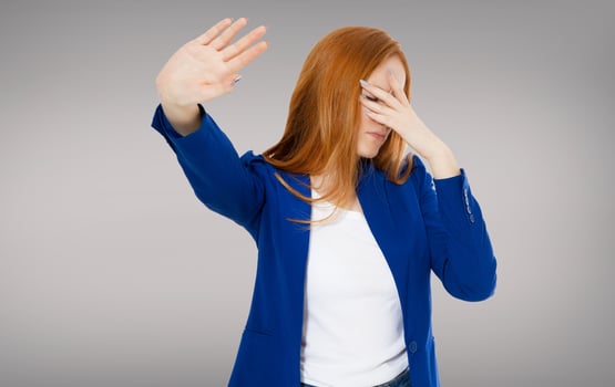 Woman do facepalm and rejection something on gray background copy space photo