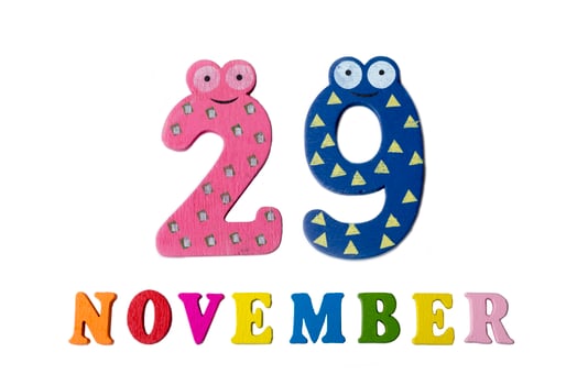 November 29 on white background, numbers and letters. photo