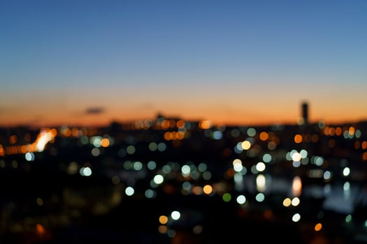 Landscape with blurred lights of the night city. photo